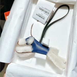 Hermes budy bag charm shearling and leather. Blue